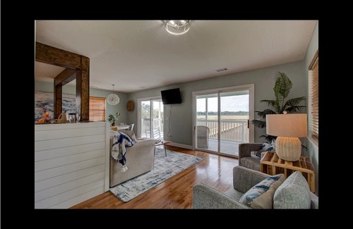 Midway House | Waterfront with dock, pool and boat lift, crab traps and paddle boards. Yes-Pets