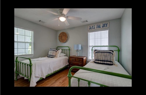 Midway House | Waterfront with dock, pool and boat lift, crab traps and paddle boards. Yes-Pets