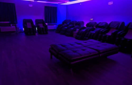 Indianapolis Apartment | Beds Are Overrated. Choose Luxury Massage Chairs. A 1 of a Kind Experience.