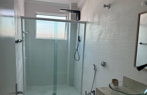 Embare Apartment | Walk to the beach and Shopping Mall. Private garage