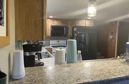 Pentwater Cottage | Cozy 3-bedroom cottage, large yard, minutes from Lake Michigan. Pet friendly.