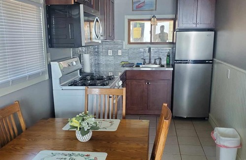 Chisago City Cabin | 40 Min from the cities, 4 ft from the shore! Sandy beach. Fish off the dock!