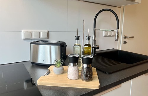 Bedingrade Apartment | Ruhiges Apartment mit Balkon - Küche - Smarttv