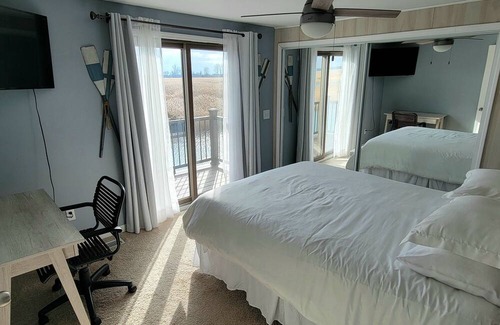 Anchorville House | Lake St. Clair Canal Cottage. Fishing, views, dockage, and more!