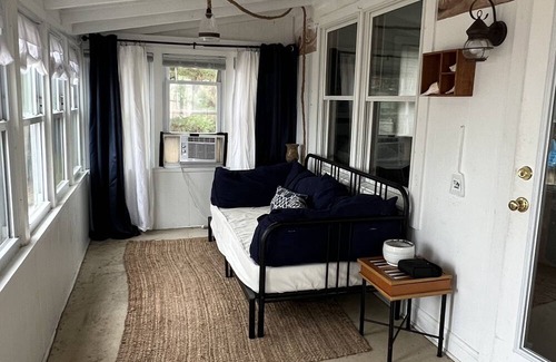 Slaughter Beach House | Beachfront Cottage with detached screened porch with stunning beach views.