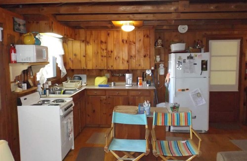 Naples House | Cozy cottage in serene setting with a lovely sandy entry to Brandy Pond!