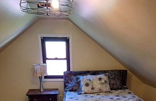 Spring Grove Village House | Charming woodside cabin feel.