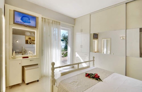 Perama House | Homerez - Nice house 500 m away from the beach for 4 ppl. with garden at Corfu