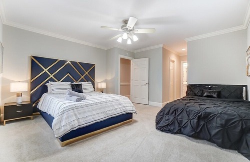 Wessex Square House | Uptown Luxe w/ King Suite & Hot Tub | Sleeps 20+