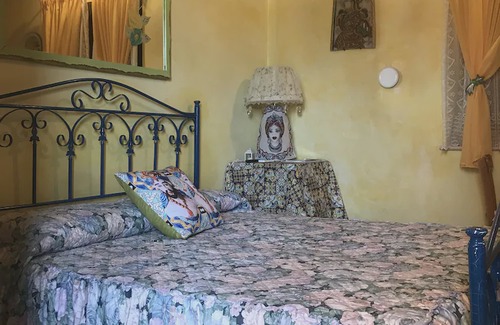 Agrigento Ski Chalet | "The Garden of Athena" suite evocative view of the Valley of the Temples.