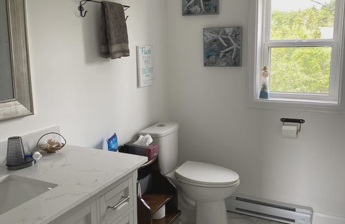 Halifax County House | Renovated 150 year old house, snuggled in the cove with ocean views