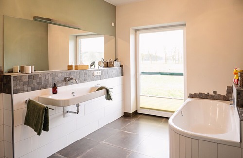 Soltau Villa | Idyllically situated villa in country house style with sauna Ideal for groups & families