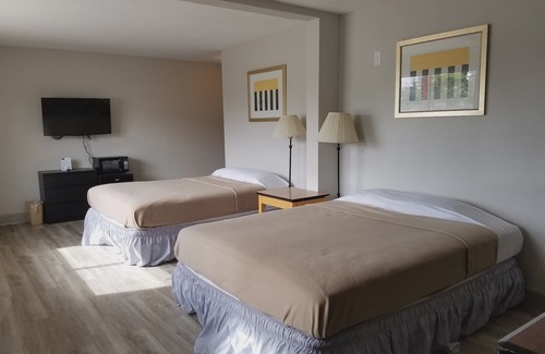 Beaumont Hotel | Harmony Inn and Suites