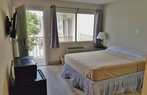 Beaumont Hotel | Harmony Inn and Suites