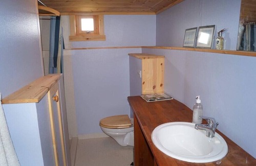 Leynar House | Cottage with stunning view of the sea and islands.