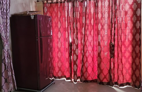 Thakurpukur Apartment | Elegant Spacious 2-bedroom AC Apartment balcony Kolkata Tollygunge~ pet friendly