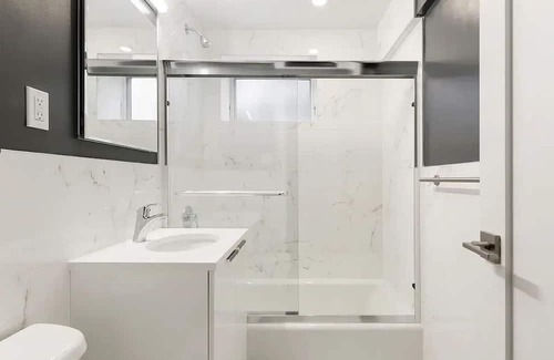 Queens House | Building with fitness room and AC in cool Far Rockaway