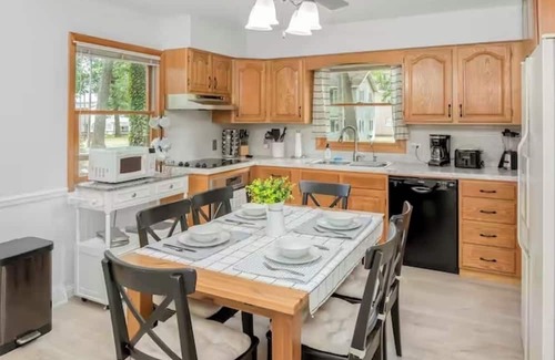 Shelbyville House | Spacious 4-bedroom house on Gun Lake with private hot tub.