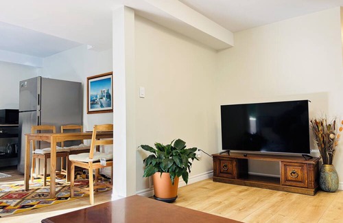 Rosemount Apartment | Bright and Private walkout basement near downtown Kitchener with garden access.