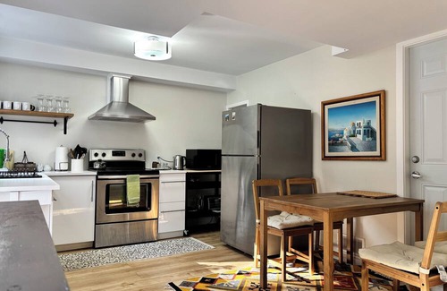 Rosemount Apartment | Bright and Private walkout basement near downtown Kitchener with garden access.