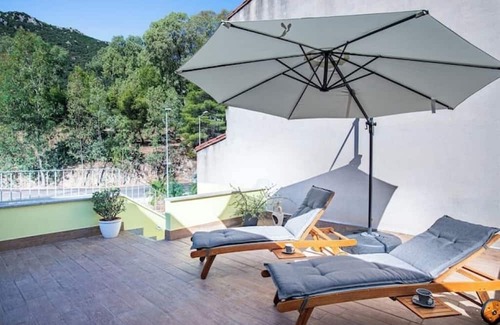 Guspini House | Cozy atmosphere in the room with private bathroom