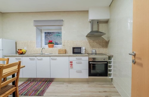 Vila Nova de Gaia House | Rustic and Modern Stone House by Host Wise