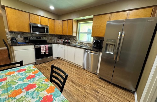 Palm Terrace Gardens House | nCozy Gulf Coast Getaway 3 BR 2 BA house in charming Port Richey with WiFi, AC.