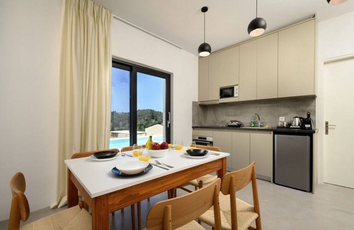 Kavvadades Villa | Lavish Corfu Villa | Villa Elysian View | 1 Bedroom | Spacious Furnished Terrace with Shaded Outdoor Dining Area | Private Garden, Pool and Hot Tub | Prime Location | Arillas, Mega Lithari