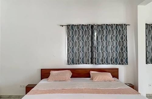 Assinie Bed & Breakfast | Mako room: idyllic setting with breakfast