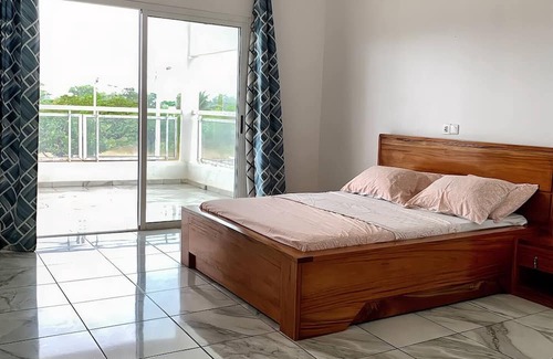 Assinie Bed & Breakfast | Kimberly room: idyllic setting with breakfast