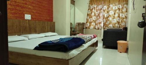 Omkareshwar Hotel | Hotel Shri Radhe Krishna,Omkareshwar