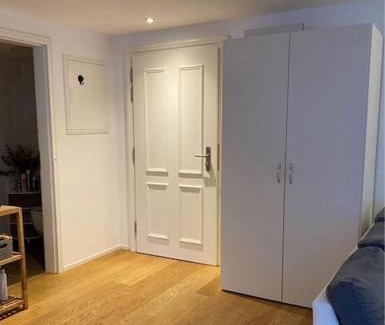 Unterseen Apartment | Moderno appartamento con balcone vista fiume e Monte Jungfrau