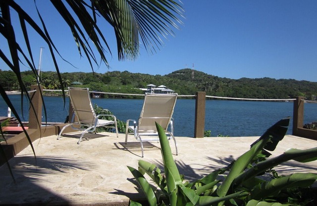 Luxury Waterfront Condo w/ Pool, Dock, and Gardens