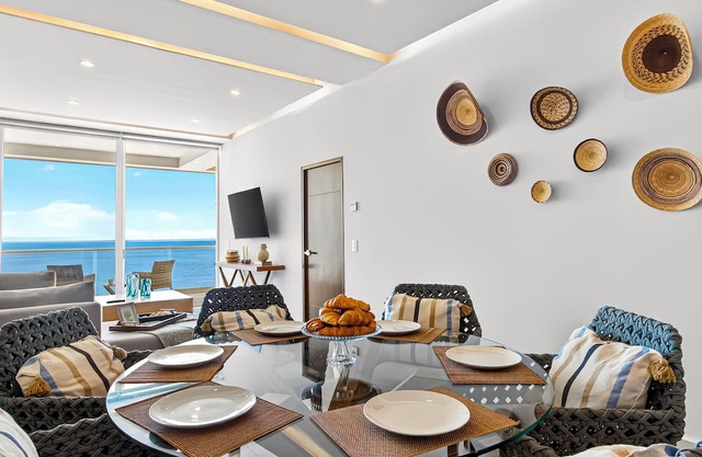Beachfront 2BR - Pools & Balcony Views