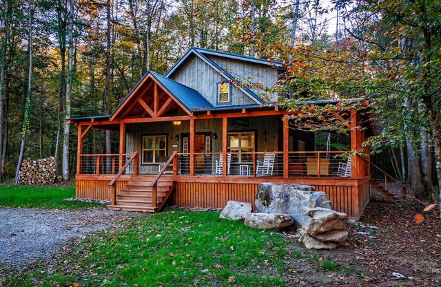 Secluded cabin beside private river, surrounded by peaceful nature