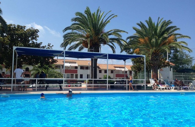 Holiday Apartment "Villa Patrizia - Residence La Giungla" with Sea View, Shared Pool & Wi-Fi