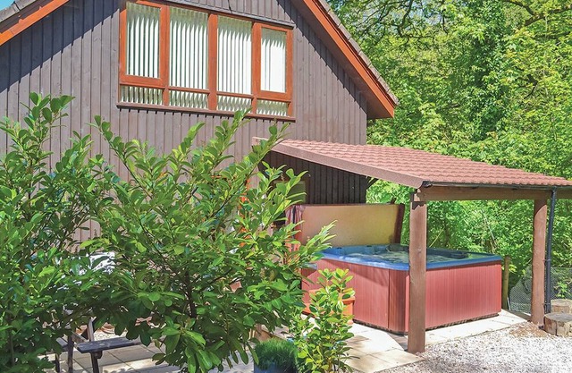 Luxury lodge residing at the top of the wooded valley.
