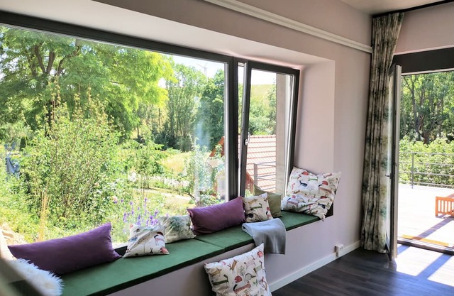 Charming house close to the city & yet in the countryside, with large terrace, garden, carport