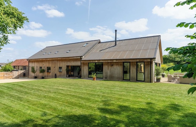 Luxury, architect designed 7 bedroom barn conversion in idyllic rural setting.