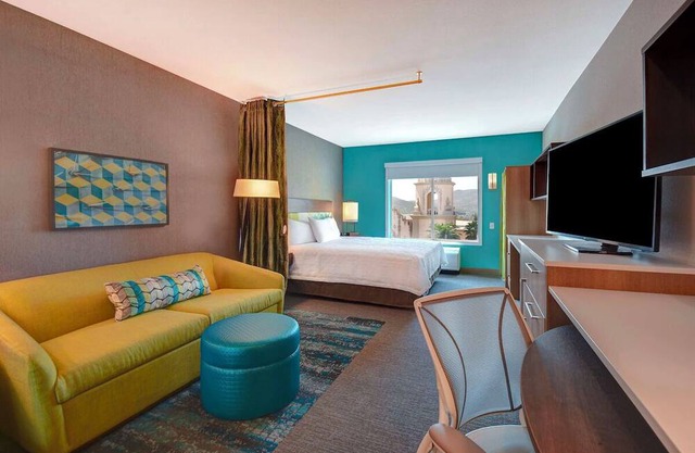 Cityscape Views and Comfort! Free Breakfast, Parking, Pool, Pets Allowed!