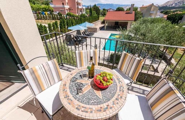 Holiday apartment with shared swimming pool