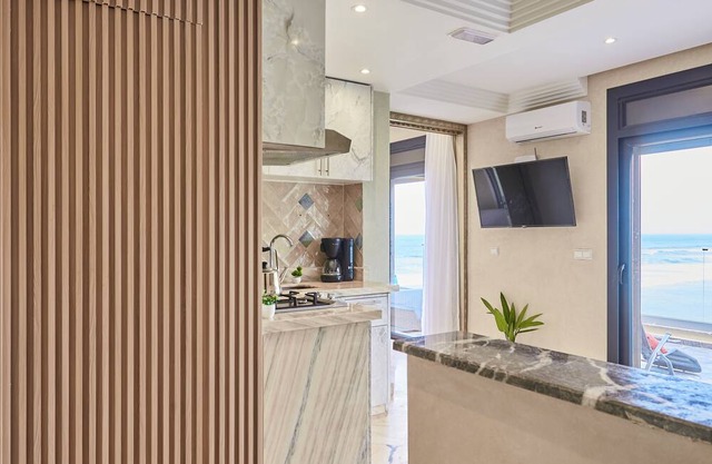 Wake to Waves: Stylish 1-Bedroom by the Shore