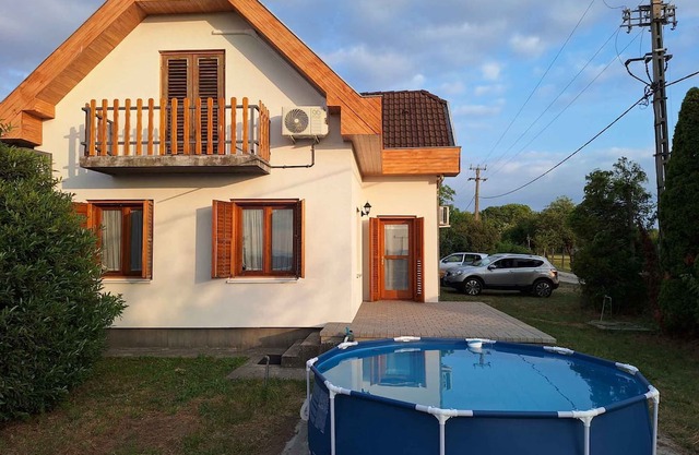 Holiday home with pool, lake view, terrace and panorama in Weinberg