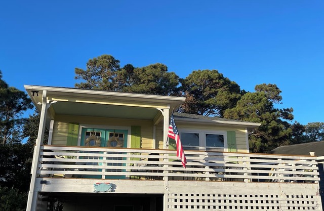 "Semi-soundfront beach cottage with beautiful water views and pool access!