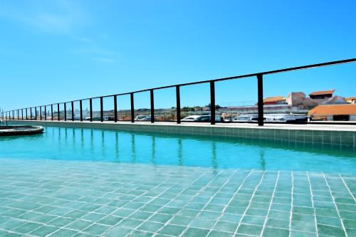 Luxo com Piscina Privativa no Centro de Porto