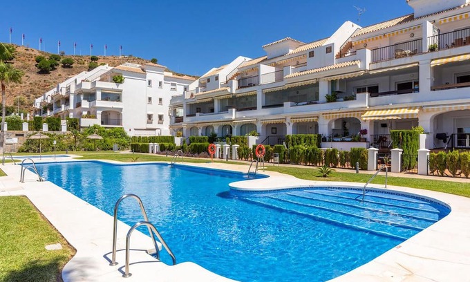 Rincon de la Victoria Apartment | Comfortable, attractively located vacation home with shared pool and panoramic sea views.