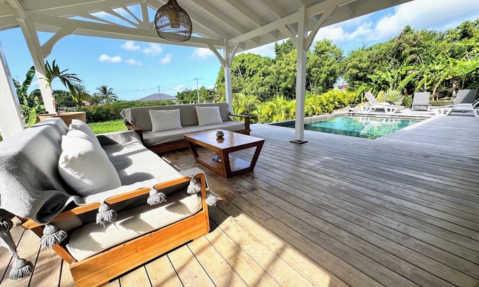 Grand-Bourg Villa | Grey houses, a beautiful villa featuring a piscine, cosy and spacious areas