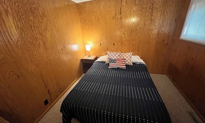 Cadillac Cabin | 3-bedroom cabin in charming Harrietta with WiFi. Perfect for a getaway.