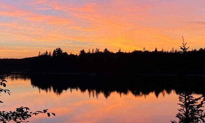 Nevis Cabin | Booking now for summer! Stunning vintage log home on pristine lake.