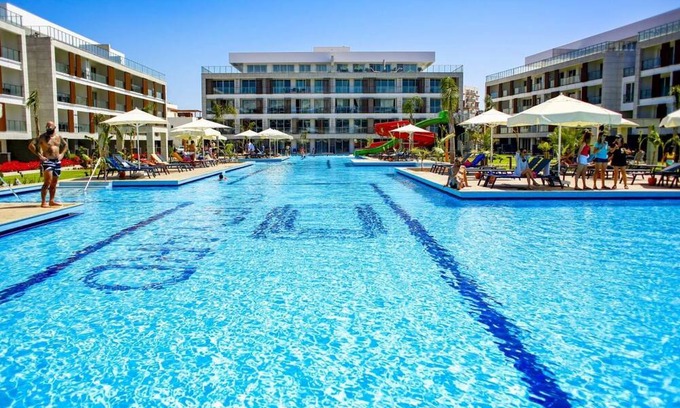 Trikomo Apartment | Delightful Studio Flat Close to the Beach with Shared Pool and Balcony in Iskele, Cyprus